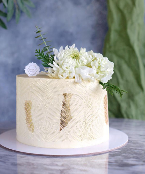 White Cake With Gold Leaf